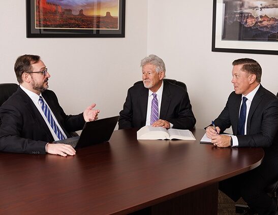 imageye___ _imgi_27_legal team sitting around conference table cropped e1777408102265